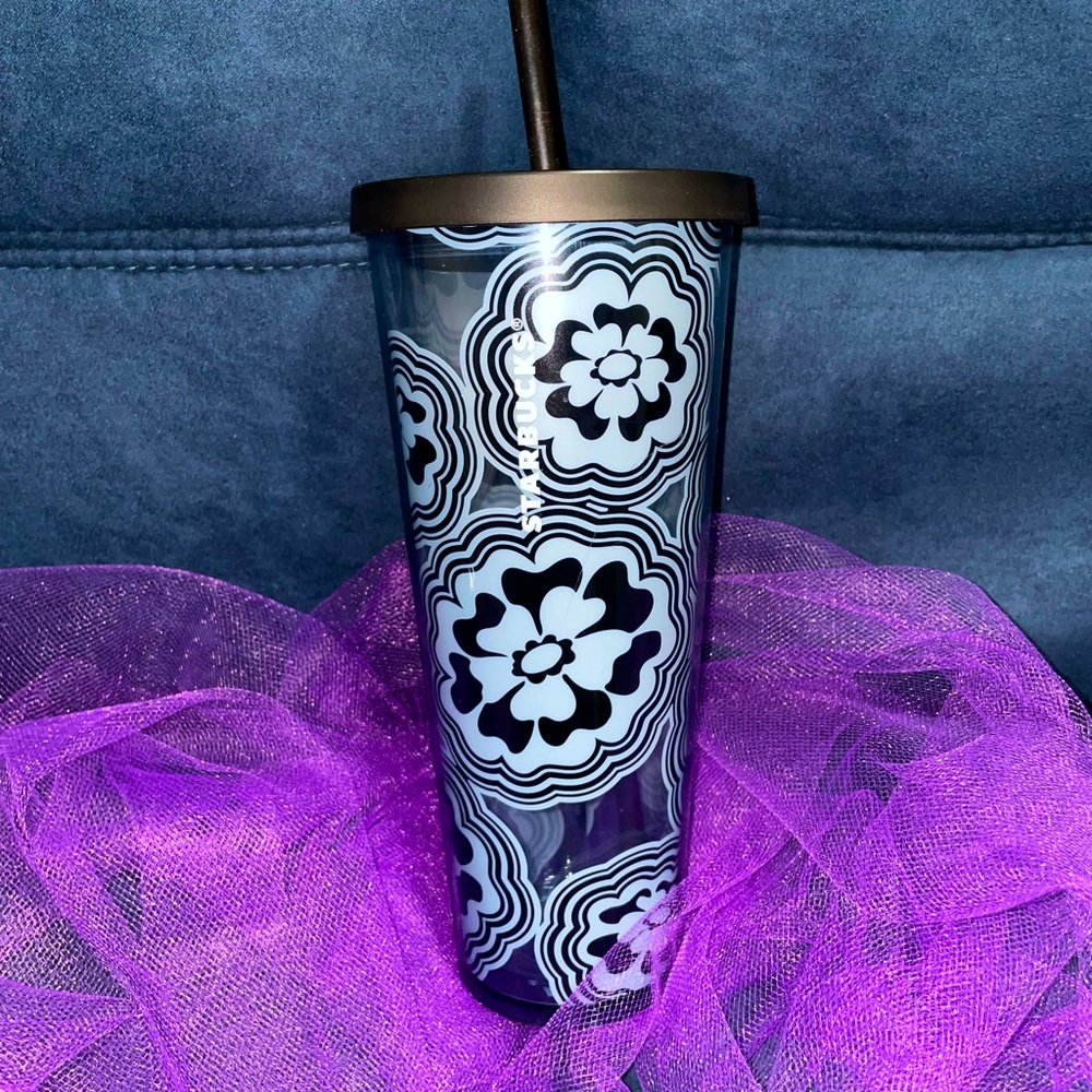Starbucks tumbler, scratch on bottom.